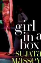 Girl in  a Box
by Sujata Massey